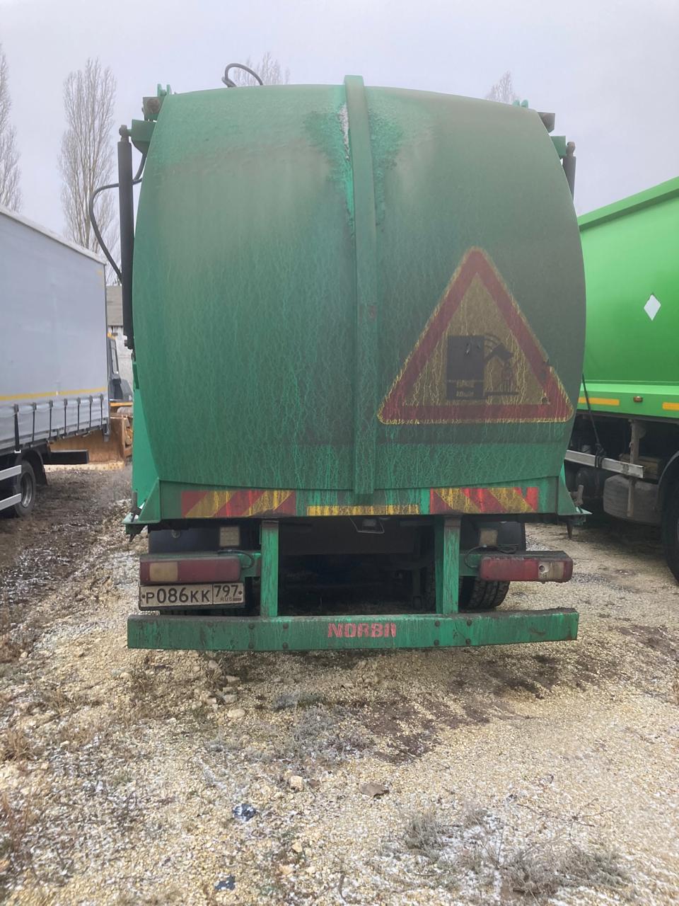 ПМЗ-АвтоБетон UMC* на шасси DAF LF 4x2 Мусоровоз 2018 г. - фото 4