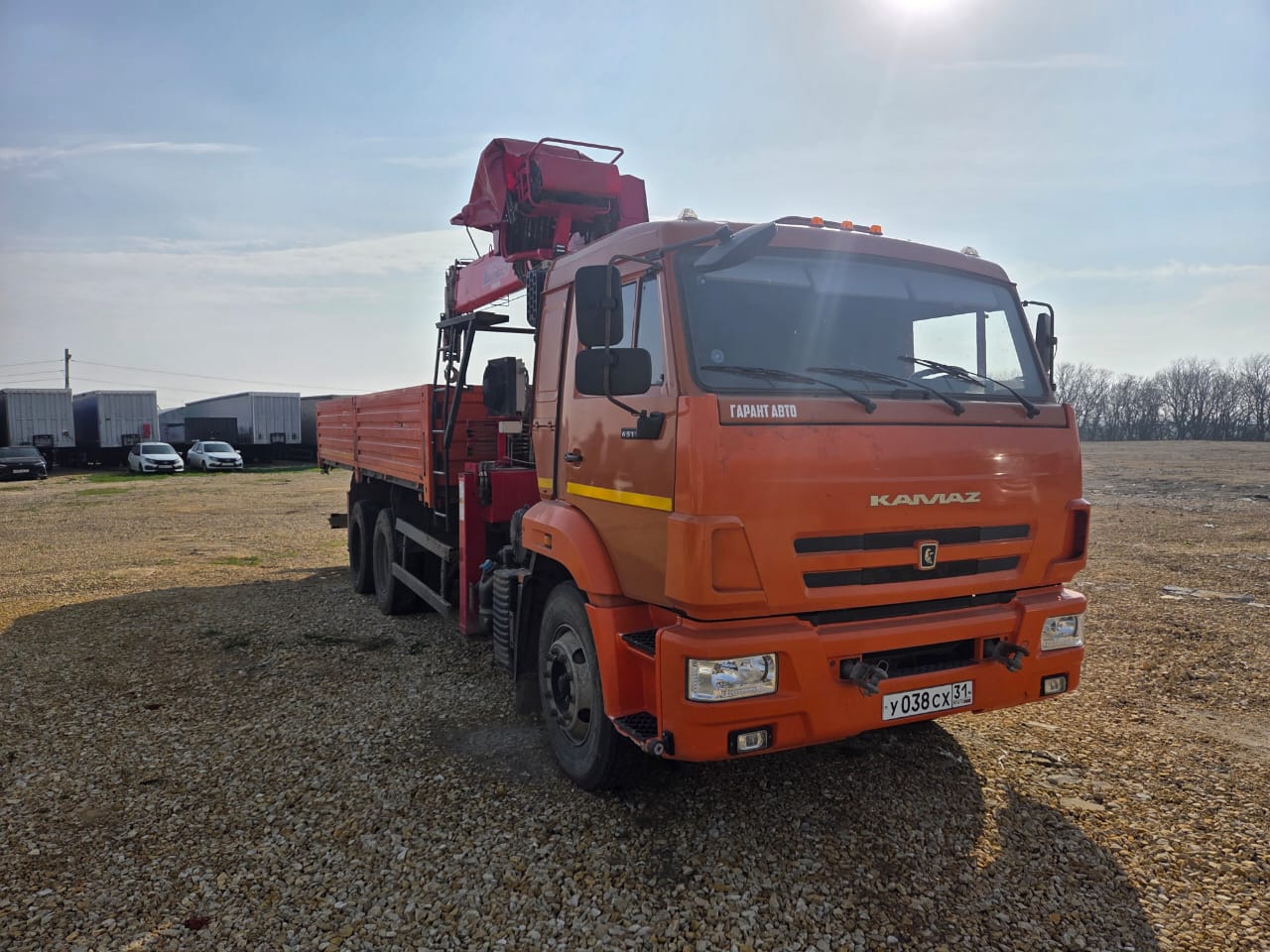 Кран центр "КАМАЗ" 6590* на шасси КамАЗ 65115 6x4 Бортовой с КМУ 2022 г. - фото 2